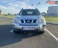 Серый Ниссан ИксТрейл, объемом двигателя 2 л и пробегом 210 тыс. км за 9889 $, фото 1 на Automoto.ua