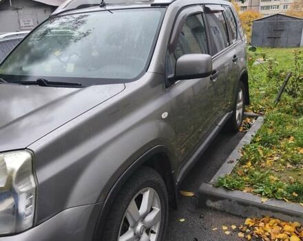 Серый Ниссан ИксТрейл, объемом двигателя 2.49 л и пробегом 118 тыс. км за 9700 $, фото 1 на Automoto.ua