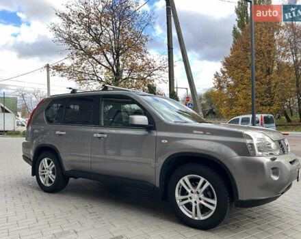 Серый Ниссан ИксТрейл, объемом двигателя 2 л и пробегом 229 тыс. км за 10100 $, фото 3 на Automoto.ua