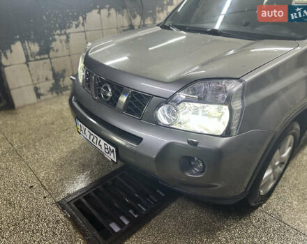Серый Ниссан ИксТрейл, объемом двигателя 2 л и пробегом 262 тыс. км за 8900 $, фото 1 на Automoto.ua