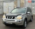 Серый Ниссан ИксТрейл, объемом двигателя 2 л и пробегом 240 тыс. км за 7600 $, фото 3 на Automoto.ua