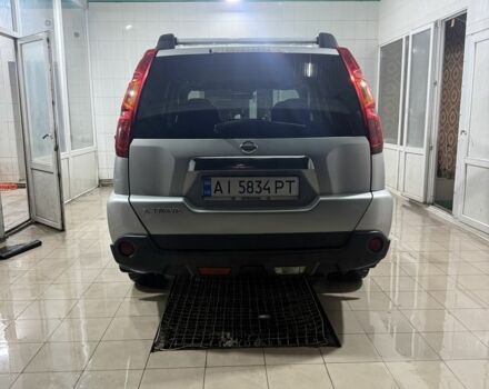 Сірий Ніссан ІксТрейл, об'ємом двигуна 2.5 л та пробігом 175 тис. км за 7600 $, фото 3 на Automoto.ua