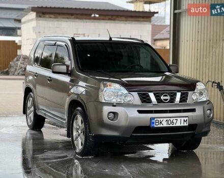 Сірий Ніссан ІксТрейл, об'ємом двигуна 2 л та пробігом 238 тис. км за 9400 $, фото 4 на Automoto.ua