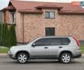 Сірий Ніссан ІксТрейл, об'ємом двигуна 2 л та пробігом 238 тис. км за 9400 $, фото 1 на Automoto.ua