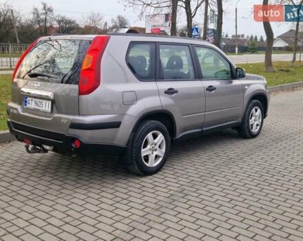 Сірий Ніссан ІксТрейл, об'ємом двигуна 2 л та пробігом 212 тис. км за 9900 $, фото 4 на Automoto.ua