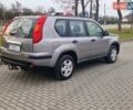 Сірий Ніссан ІксТрейл, об'ємом двигуна 2 л та пробігом 212 тис. км за 9900 $, фото 4 на Automoto.ua