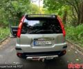 Серый Ниссан ИксТрейл, объемом двигателя 2 л и пробегом 290 тыс. км за 9800 $, фото 2 на Automoto.ua