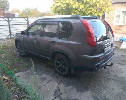 Сірий Ніссан ІксТрейл, об'ємом двигуна 2 л та пробігом 242 тис. км за 7300 $, фото 3 на Automoto.ua