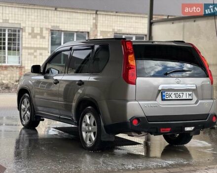 Сірий Ніссан ІксТрейл, об'ємом двигуна 2 л та пробігом 238 тис. км за 9400 $, фото 6 на Automoto.ua