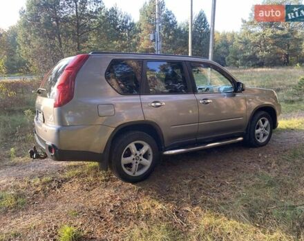 Серый Ниссан ИксТрейл, объемом двигателя 2 л и пробегом 272 тыс. км за 10000 $, фото 7 на Automoto.ua