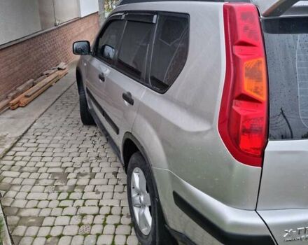 Сірий Ніссан ІксТрейл, об'ємом двигуна 2.5 л та пробігом 179 тис. км за 10500 $, фото 11 на Automoto.ua