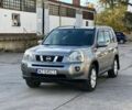 Сірий Ніссан ІксТрейл, об'ємом двигуна 2 л та пробігом 214 тис. км за 3453 $, фото 1 на Automoto.ua