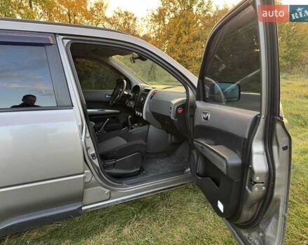 Сірий Ніссан ІксТрейл, об'ємом двигуна 2 л та пробігом 238 тис. км за 9400 $, фото 43 на Automoto.ua