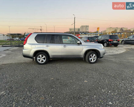 Серый Ниссан ИксТрейл, объемом двигателя 2.49 л и пробегом 260 тыс. км за 8499 $, фото 3 на Automoto.ua