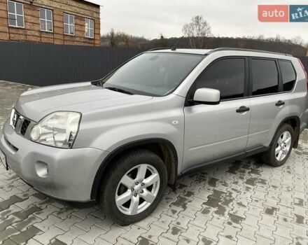 Серый Ниссан ИксТрейл, объемом двигателя 2 л и пробегом 235 тыс. км за 9500 $, фото 6 на Automoto.ua