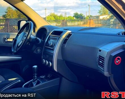 Серый Ниссан ИксТрейл, объемом двигателя 2 л и пробегом 189 тыс. км за 8950 $, фото 7 на Automoto.ua