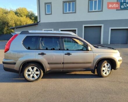 Серый Ниссан ИксТрейл, объемом двигателя 2 л и пробегом 213 тыс. км за 9400 $, фото 12 на Automoto.ua