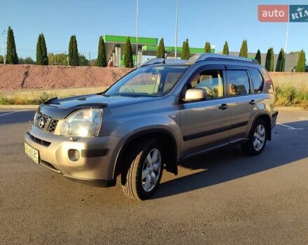 Серый Ниссан ИксТрейл, объемом двигателя 2 л и пробегом 213 тыс. км за 9400 $, фото 5 на Automoto.ua