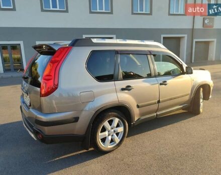 Серый Ниссан ИксТрейл, объемом двигателя 2 л и пробегом 213 тыс. км за 9400 $, фото 11 на Automoto.ua