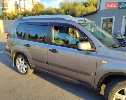 Серый Ниссан ИксТрейл, объемом двигателя 2 л и пробегом 213 тыс. км за 9400 $, фото 13 на Automoto.ua