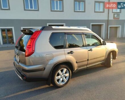 Серый Ниссан ИксТрейл, объемом двигателя 2 л и пробегом 213 тыс. км за 9400 $, фото 7 на Automoto.ua