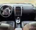 Сірий Ніссан ІксТрейл, об'ємом двигуна 2.5 л та пробігом 236 тис. км за 11000 $, фото 5 на Automoto.ua