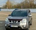 Сірий Ніссан ІксТрейл, об'ємом двигуна 2.5 л та пробігом 236 тис. км за 11000 $, фото 2 на Automoto.ua