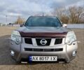 Сірий Ніссан ІксТрейл, об'ємом двигуна 2.49 л та пробігом 236 тис. км за 10999 $, фото 8 на Automoto.ua