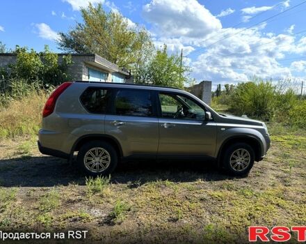 Серый Ниссан ИксТрейл, объемом двигателя 2 л и пробегом 240 тыс. км за 11500 $, фото 2 на Automoto.ua