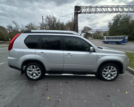 Серый Ниссан ИксТрейл, объемом двигателя 2 л и пробегом 255 тыс. км за 10500 $, фото 2 на Automoto.ua
