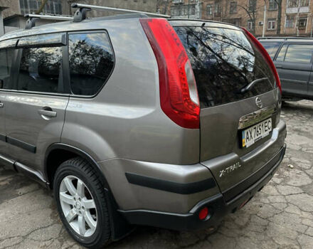 Сірий Ніссан ІксТрейл, об'ємом двигуна 2.49 л та пробігом 79 тис. км за 11150 $, фото 3 на Automoto.ua