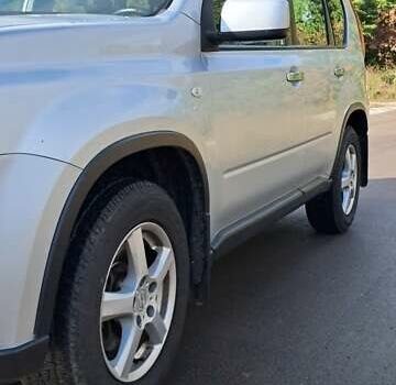 Сірий Ніссан ІксТрейл, об'ємом двигуна 2 л та пробігом 297 тис. км за 12350 $, фото 7 на Automoto.ua