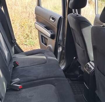 Сірий Ніссан ІксТрейл, об'ємом двигуна 2 л та пробігом 297 тис. км за 12350 $, фото 12 на Automoto.ua