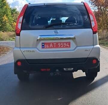 Сірий Ніссан ІксТрейл, об'ємом двигуна 2 л та пробігом 297 тис. км за 12350 $, фото 2 на Automoto.ua
