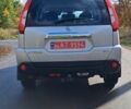 Сірий Ніссан ІксТрейл, об'ємом двигуна 2 л та пробігом 297 тис. км за 12350 $, фото 2 на Automoto.ua
