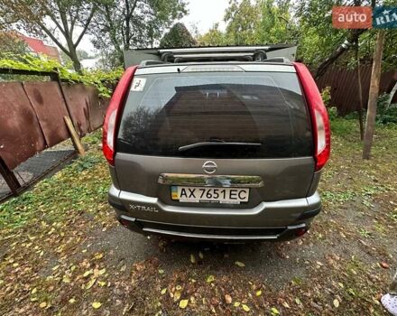 Серый Ниссан ИксТрейл, объемом двигателя 2.49 л и пробегом 79 тыс. км за 10800 $, фото 2 на Automoto.ua