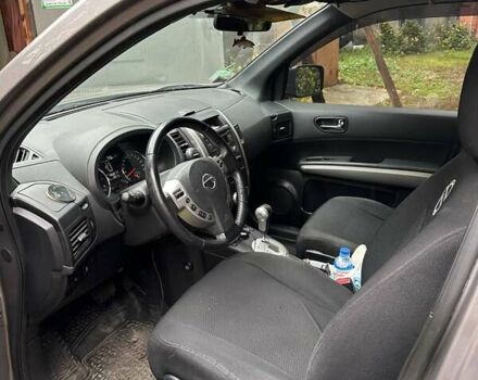 Серый Ниссан ИксТрейл, объемом двигателя 2.49 л и пробегом 79 тыс. км за 10800 $, фото 8 на Automoto.ua