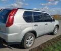 Серый Ниссан ИксТрейл, объемом двигателя 2 л и пробегом 90 тыс. км за 12500 $, фото 2 на Automoto.ua
