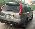 Серый Ниссан ИксТрейл, объемом двигателя 2 л и пробегом 185 тыс. км за 9300 $, фото 5 на Automoto.ua