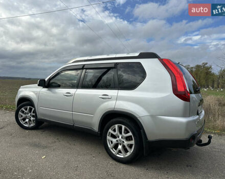 Серый Ниссан ИксТрейл, объемом двигателя 2 л и пробегом 158 тыс. км за 10300 $, фото 3 на Automoto.ua
