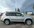 Сірий Ніссан ІксТрейл, об'ємом двигуна 2 л та пробігом 225 тис. км за 10700 $, фото 1 на Automoto.ua