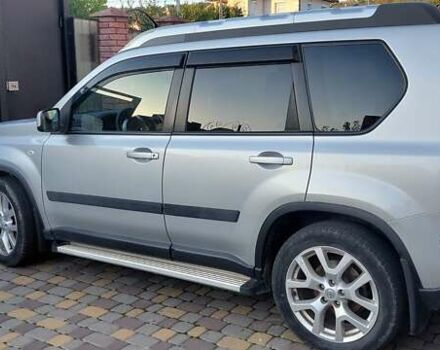 Серый Ниссан ИксТрейл, объемом двигателя 2 л и пробегом 90 тыс. км за 14500 $, фото 1 на Automoto.ua