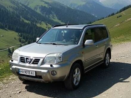 Серый Ниссан ИксТрейл, объемом двигателя 2 л и пробегом 231 тыс. км за 5300 $, фото 1 на Automoto.ua