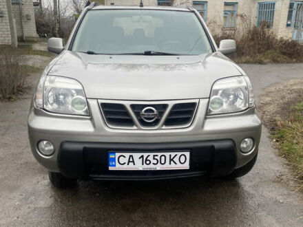 Сірий Ніссан ІксТрейл, об'ємом двигуна 2 л та пробігом 276 тис. км за 6400 $, фото 1 на Automoto.ua