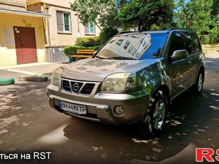Серый Ниссан ИксТрейл, объемом двигателя 2 л и пробегом 219 тыс. км за 6700 $, фото 1 на Automoto.ua