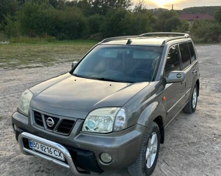Сірий Ніссан ІксТрейл, об'ємом двигуна 2.2 л та пробігом 400 тис. км за 4699 $, фото 1 на Automoto.ua