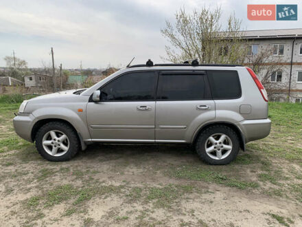 Сірий Ніссан ІксТрейл, об'ємом двигуна 2 л та пробігом 354 тис. км за 6000 $, фото 1 на Automoto.ua