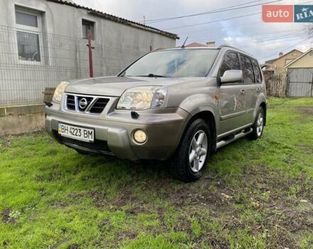 Сірий Ніссан ІксТрейл, об'ємом двигуна 2 л та пробігом 221 тис. км за 5000 $, фото 1 на Automoto.ua