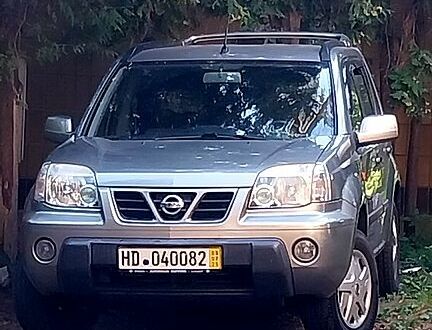 Сірий Ніссан ІксТрейл, об'ємом двигуна 2.1 л та пробігом 119 тис. км за 3500 $, фото 1 на Automoto.ua