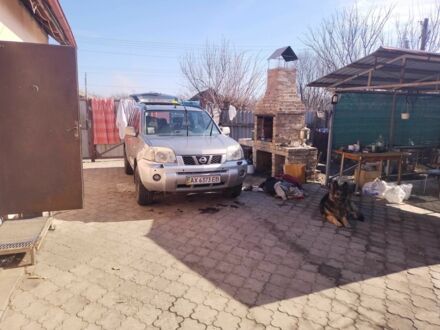 Серый Ниссан ИксТрейл, объемом двигателя 2.5 л и пробегом 239 тыс. км за 5800 $, фото 1 на Automoto.ua